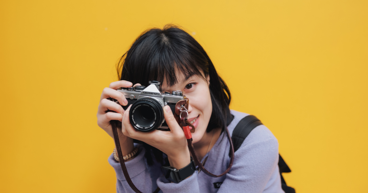 person holding a camera